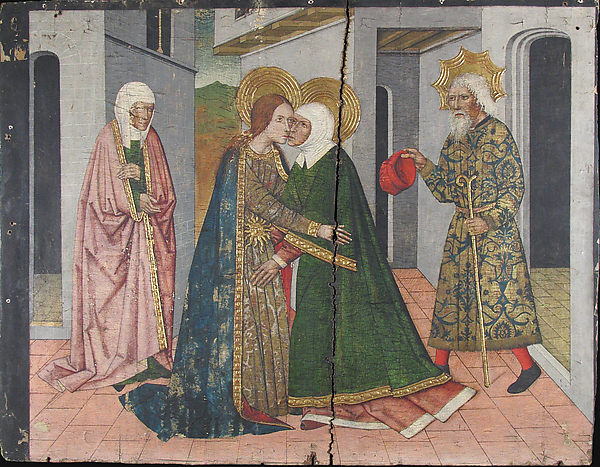 Mary and Elizabeth embrace while Zechariah and Joseph look on.