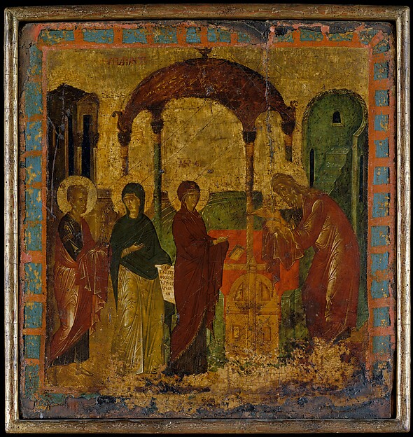 The Christ child is presented to Simeon in the Temple.